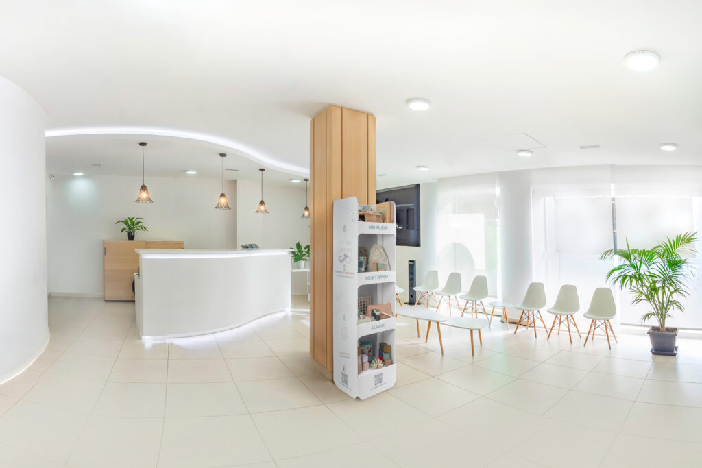 panorama of a bright reception and waiting room in a clinic with